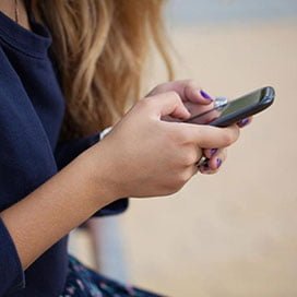 Young person with phone